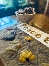 PEACE & PROSPERITY WOOL APPLIQUE TABLE MAT