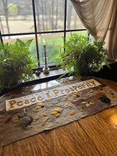 PEACE & PROSPERITY WOOL APPLIQUE TABLE MAT