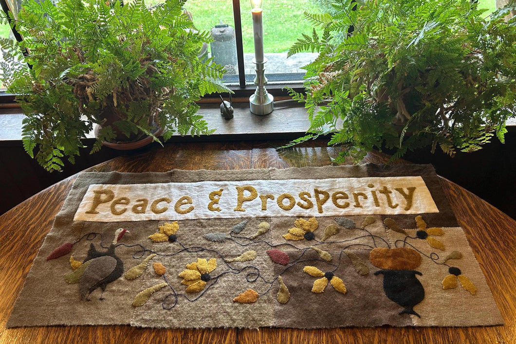 PEACE & PROSPERITY WOOL APPLIQUE TABLE MAT